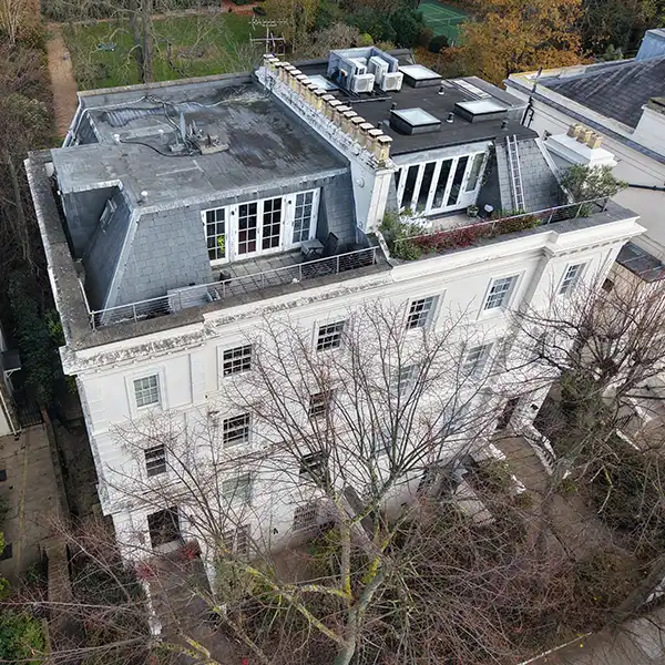 RICS regulated surveyors completing a detailed drone roof condition survey in London